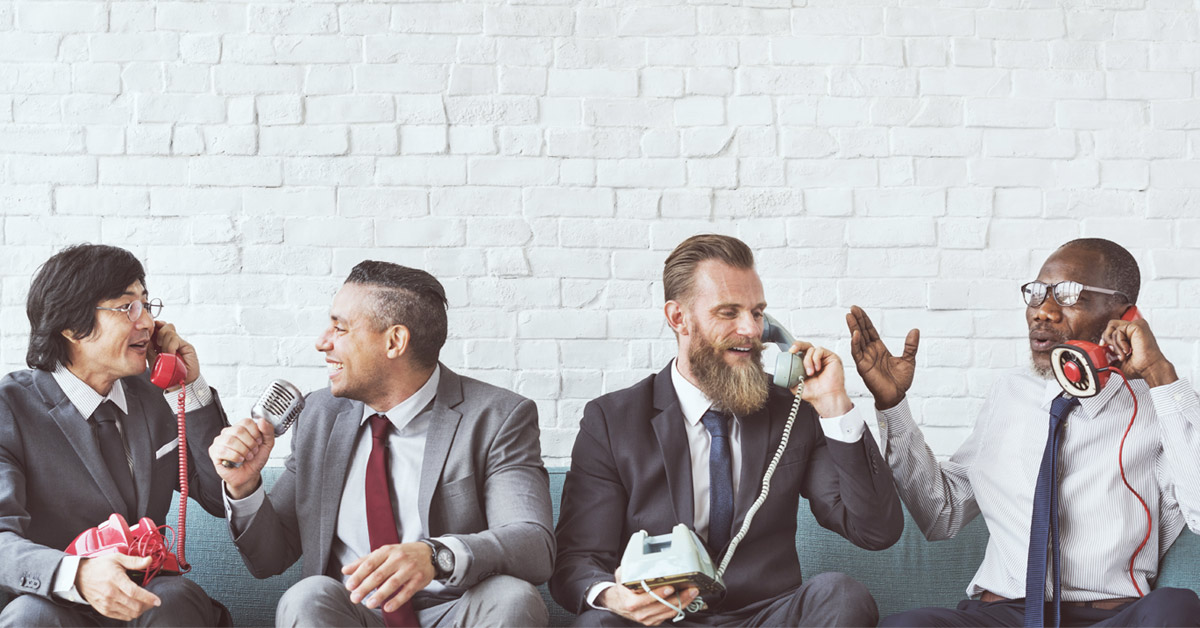 Businessmen talking on phones