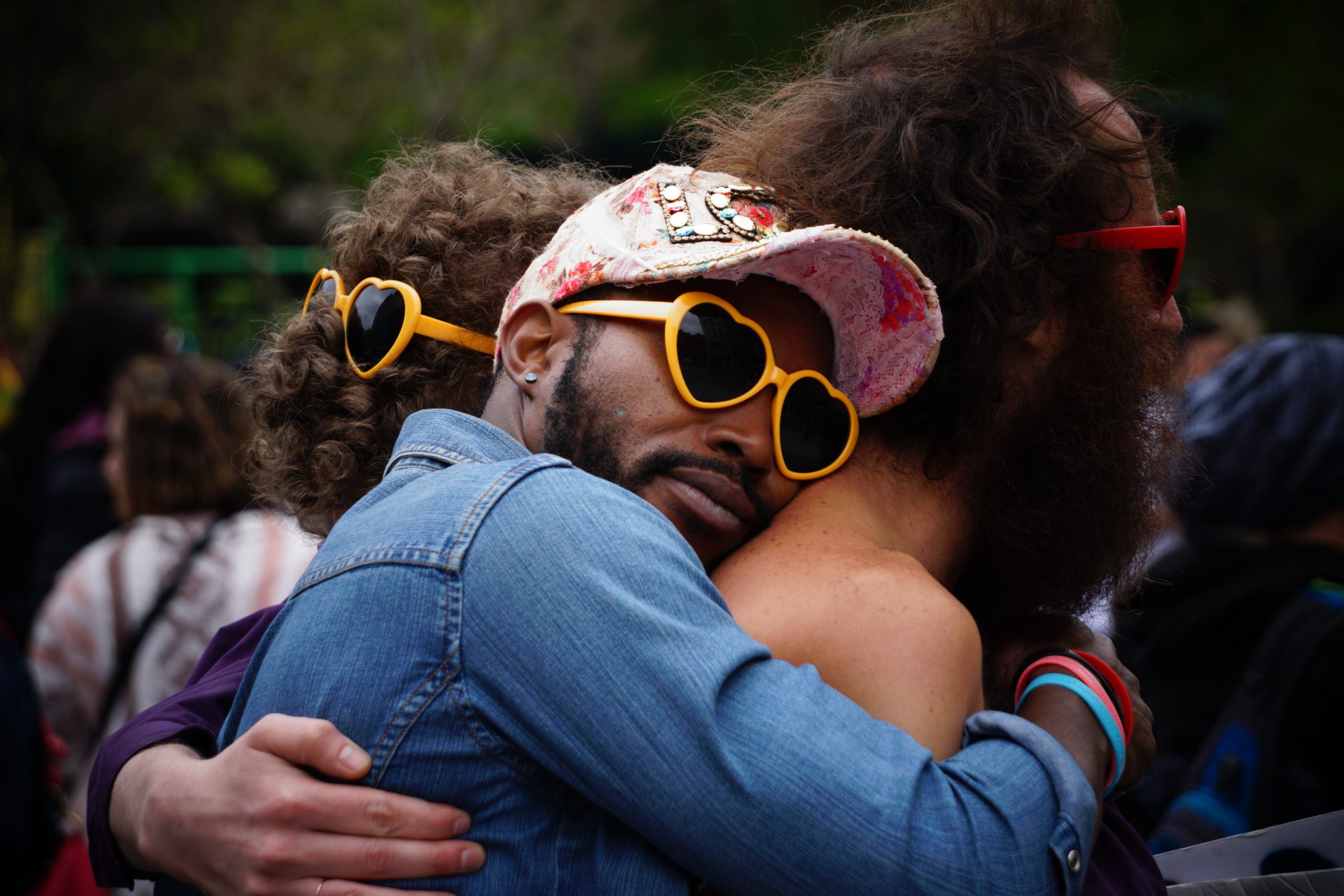 Guys hugging at festival